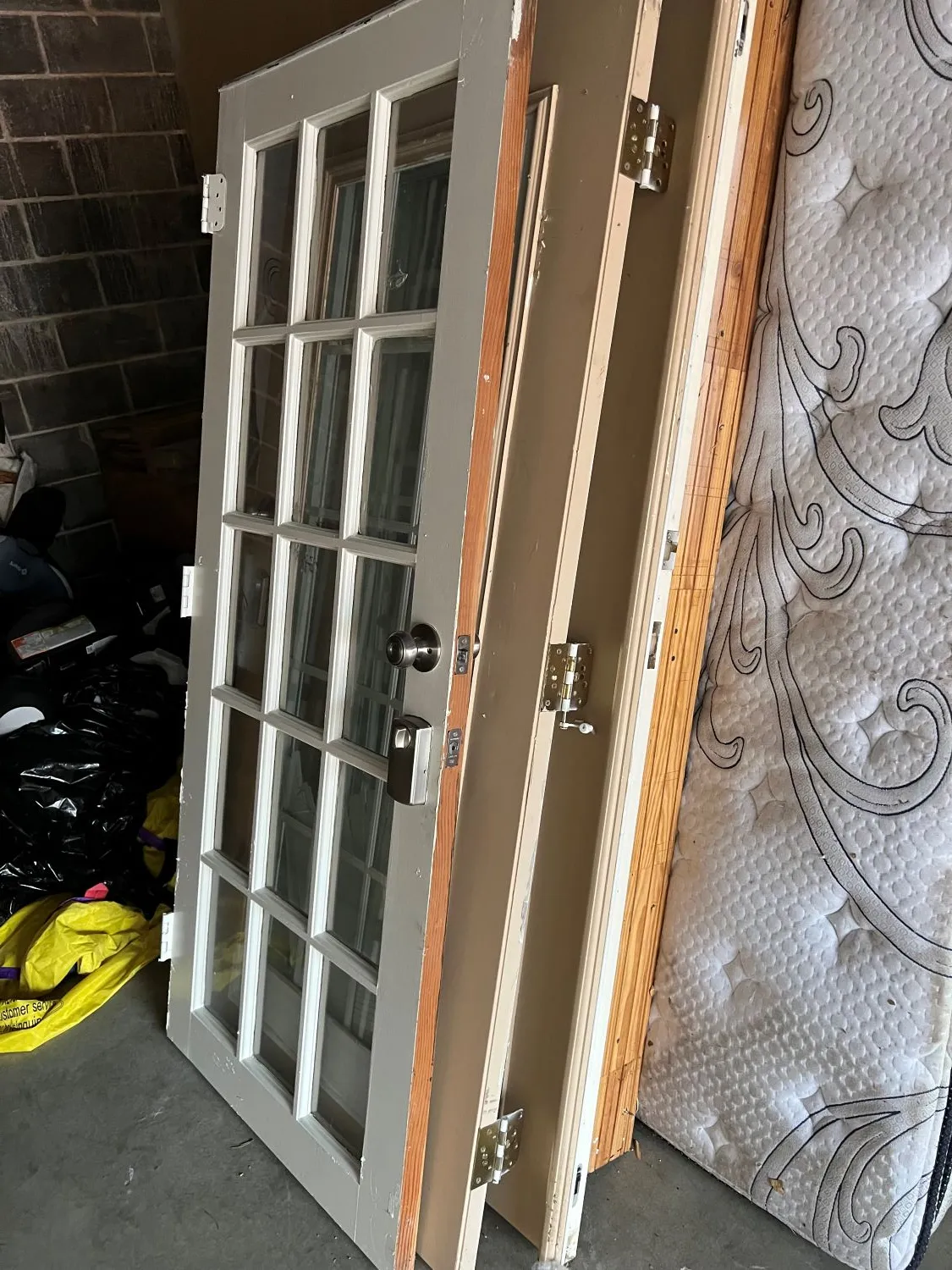 Construction debris including drywall, tile and old cabinets after renovation in Houston TX