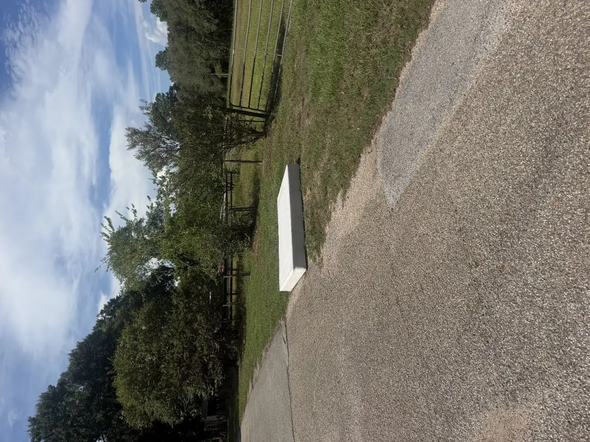 Mattress staged at the end of a gravel driveway for pickup near Lake Conroe TX 77304